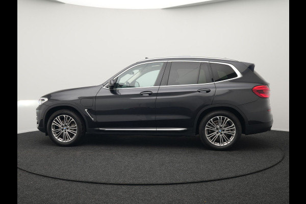 BMW X3 xDrive30e Luxury Line Plug In Hybrid 293pk PHEV | Trekhaak af Fabriek | Panodak | Adaptive Cruise | Lederen Sportstoelen Memory | 19"L.M | Sfeerverlichting | Keyless | Apple Carplay |