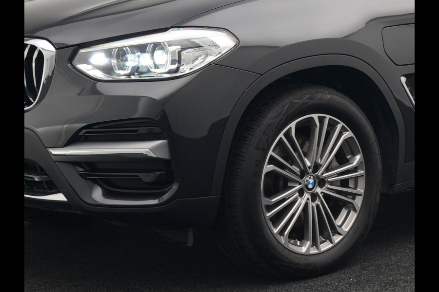 BMW X3 xDrive30e Luxury Line Plug In Hybrid 293pk PHEV | Trekhaak af Fabriek | Panodak | Adaptive Cruise | Lederen Sportstoelen Memory | 19"L.M | Sfeerverlichting | Keyless | Apple Carplay |