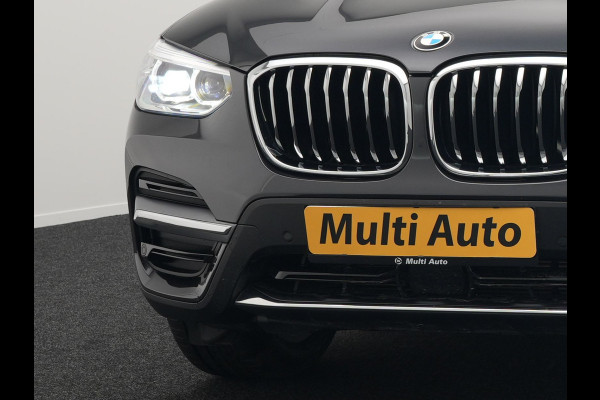 BMW X3 xDrive30e Luxury Line Plug In Hybrid 293pk PHEV | Trekhaak af Fabriek | Panodak | Adaptive Cruise | Lederen Sportstoelen Memory | 19"L.M | Sfeerverlichting | Keyless | Apple Carplay |