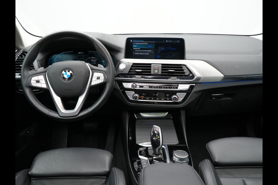 BMW X3 xDrive30e Luxury Line Plug In Hybrid 293pk PHEV | Trekhaak af Fabriek | Panodak | Adaptive Cruise | Lederen Sportstoelen Memory | 19"L.M | Sfeerverlichting | Keyless | Apple Carplay |