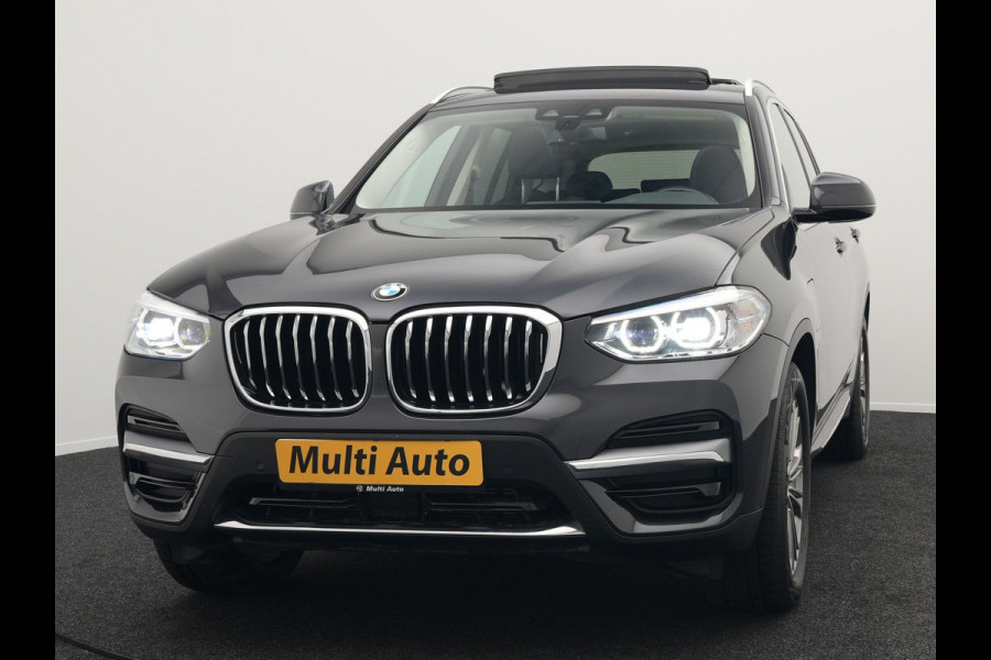 BMW X3 xDrive30e Luxury Line Plug In Hybrid 293pk PHEV | Trekhaak af Fabriek | Panodak | Adaptive Cruise | Lederen Sportstoelen Memory | 19"L.M | Sfeerverlichting | Keyless | Apple Carplay |