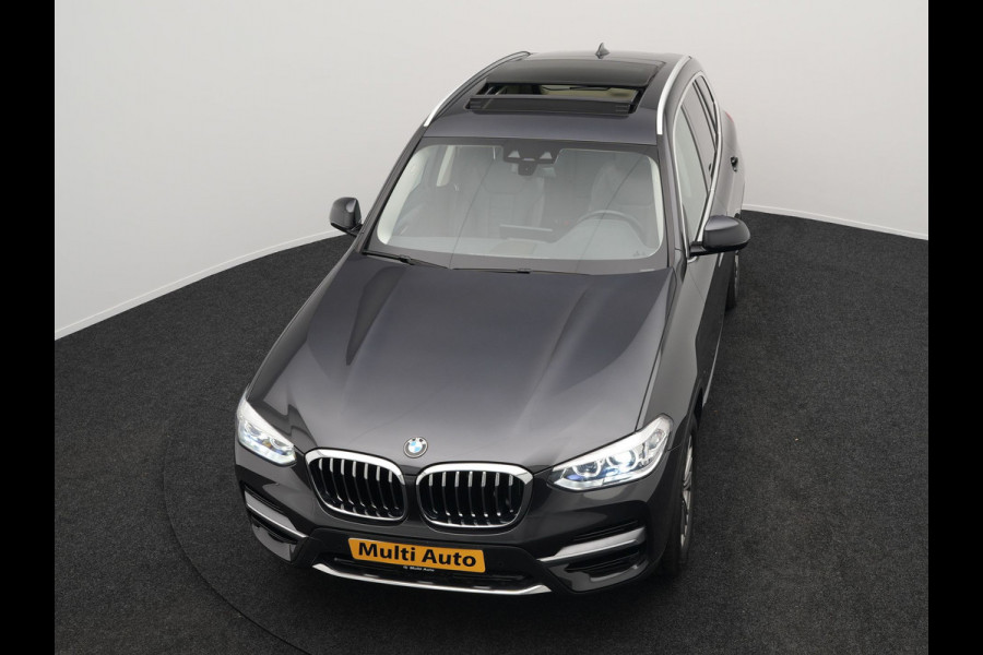 BMW X3 xDrive30e Luxury Line Plug In Hybrid 293pk PHEV | Trekhaak af Fabriek | Panodak | Adaptive Cruise | Lederen Sportstoelen Memory | 19"L.M | Sfeerverlichting | Keyless | Apple Carplay |
