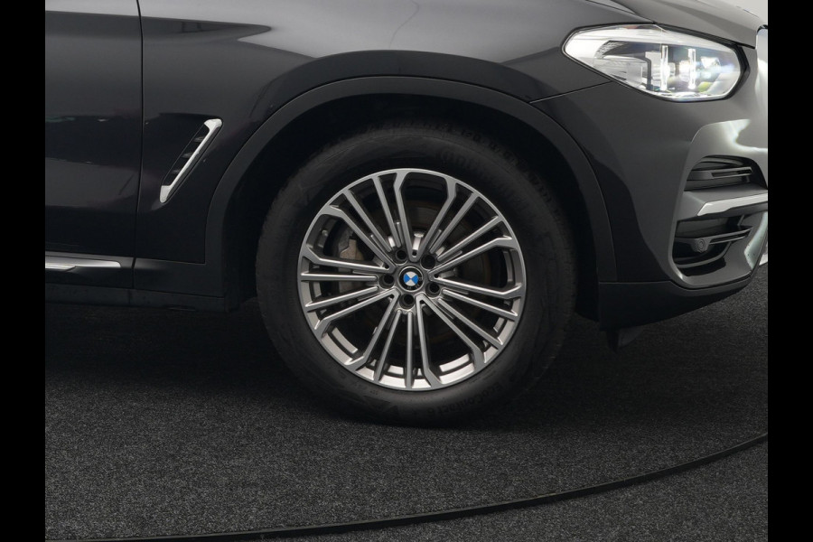 BMW X3 xDrive30e Luxury Line Plug In Hybrid 293pk PHEV | Trekhaak af Fabriek | Panodak | Adaptive Cruise | Lederen Sportstoelen Memory | 19"L.M | Sfeerverlichting | Keyless | Apple Carplay |