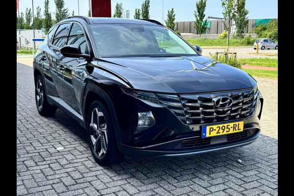 Hyundai Tucson 1.6 T-GDI HEV Premium Sky | Panorama | Carplay | Stoelverwarming voor en achter | dodehoekdetectie