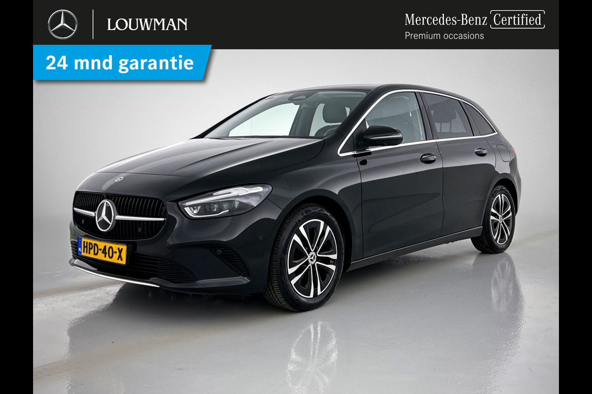 Mercedes-Benz B-Klasse 250 e Business Line Lichtmetalen velgen MBUX wide screen | Navigatie | Parking support | met camera achter | Inclusief 24 maanden Mercedes-Benz Certified garantie voor Europa. Mercedes-Benz B-Klasse 250 e Business Line Lichtmetalen velgen MBUX wide screen | Navigatie | Parking support | met camera achter | Inclusief 24 maanden Mercedes-Benz Certified garantie voor Europa.