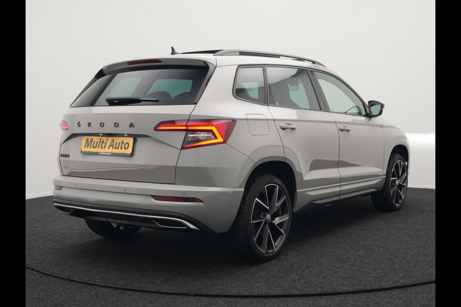 Škoda Karoq 1.5 TSI ACT Sportline 150pk DSG Dealer O.H | Panodak | Trekhaak af Fabriek | Adaptive Cruise | RS Sportstoelen Verwarmd | Camera | 19"L.M | Apple Carplay | Virtual | Keyless |