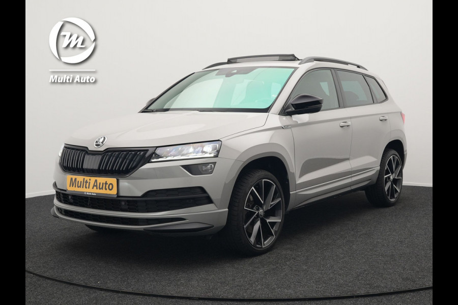 Škoda Karoq 1.5 TSI ACT Sportline 150pk DSG Dealer O.H | Panodak | Trekhaak af Fabriek | Adaptive Cruise | RS Sportstoelen Verwarmd | Camera | 19"L.M | Apple Carplay | Virtual | Keyless |