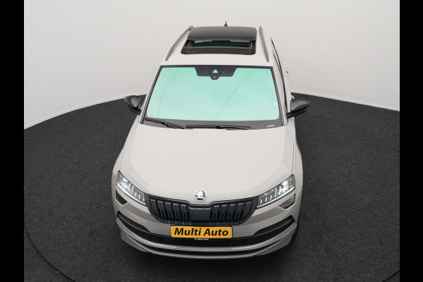Škoda Karoq 1.5 TSI ACT Sportline 150pk DSG Dealer O.H | Panodak | Trekhaak af Fabriek | Adaptive Cruise | RS Sportstoelen Verwarmd | Camera | 19"L.M | Apple Carplay | Virtual | Keyless |