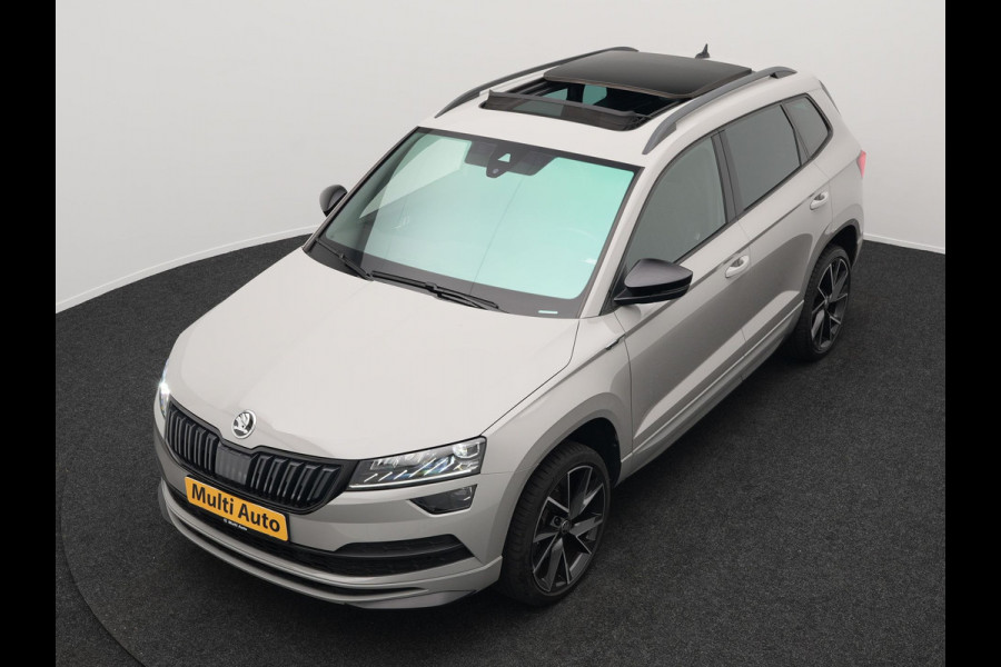 Škoda Karoq 1.5 TSI ACT Sportline 150pk DSG Dealer O.H | Panodak | Trekhaak af Fabriek | Adaptive Cruise | RS Sportstoelen Verwarmd | Camera | 19"L.M | Apple Carplay | Virtual | Keyless |