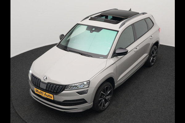 Škoda Karoq 1.5 TSI ACT Sportline 150pk DSG Dealer O.H | Panodak | Trekhaak af Fabriek | Adaptive Cruise | RS Sportstoelen Verwarmd | Camera | 19"L.M | Apple Carplay | Virtual | Keyless |