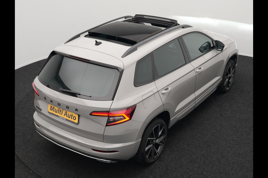 Škoda Karoq 1.5 TSI ACT Sportline 150pk DSG Dealer O.H | Panodak | Trekhaak af Fabriek | Adaptive Cruise | RS Sportstoelen Verwarmd | Camera | 19"L.M | Apple Carplay | Virtual | Keyless |