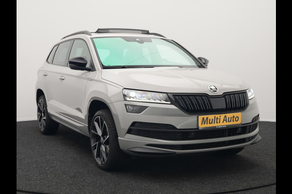 Škoda Karoq 1.5 TSI ACT Sportline 150pk DSG Dealer O.H | Panodak | Trekhaak af Fabriek | Adaptive Cruise | RS Sportstoelen Verwarmd | Camera | 19"L.M | Apple Carplay | Virtual | Keyless |