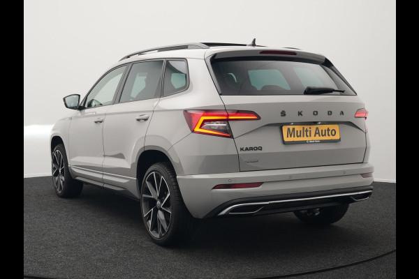 Škoda Karoq 1.5 TSI ACT Sportline 150pk DSG Dealer O.H | Panodak | Trekhaak af Fabriek | Adaptive Cruise | RS Sportstoelen Verwarmd | Camera | 19"L.M | Apple Carplay | Virtual | Keyless |