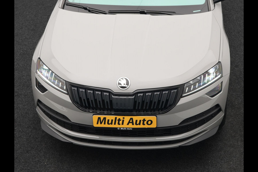Škoda Karoq 1.5 TSI ACT Sportline 150pk DSG Dealer O.H | Panodak | Trekhaak af Fabriek | Adaptive Cruise | RS Sportstoelen Verwarmd | Camera | 19"L.M | Apple Carplay | Virtual | Keyless |