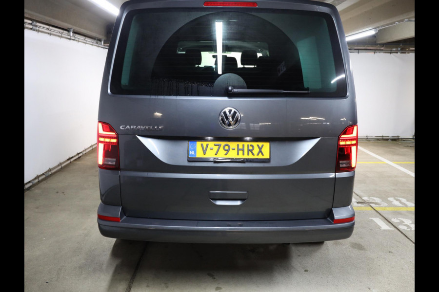 Volkswagen Transporter 2.0 TDI L2H1 32 DC Bulli 204PK DSG (Automaat) | Luxe Caravelle uitvoering | 2 schuifdeuren | Digitale cockpit | 20 "LM velgen | Automatische airco |
