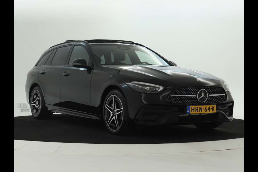 Mercedes-Benz C-Klasse Estate 300 e AMG Line | Edition AMG-Line | Night Pakket | Trekhaak | Panorama Schuif-Kanteldak | Digital Licht | DC Laden | Stuur en Stoelverwarming | Inclusief 24 maanden MB Certified garantie voor Europa.