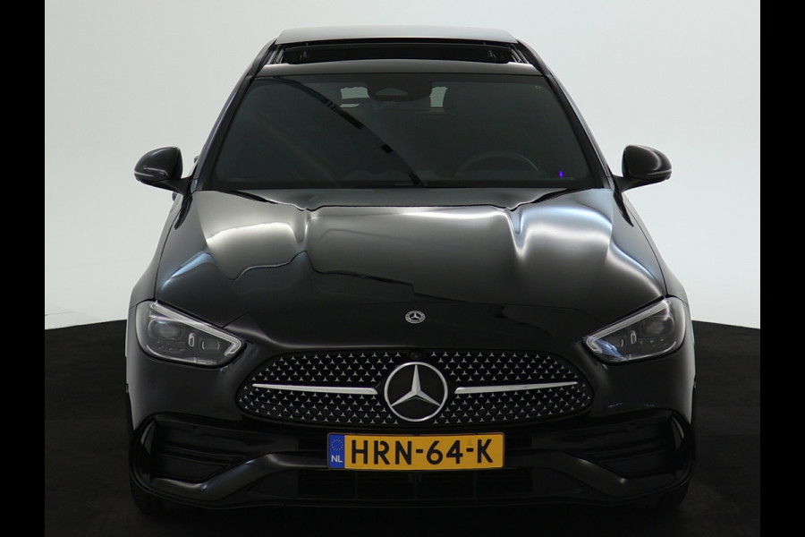 Mercedes-Benz C-Klasse Estate 300 e AMG Line | Edition AMG-Line | Night Pakket | Trekhaak | Panorama Schuif-Kanteldak | Digital Licht | DC Laden | Stuur en Stoelverwarming | Inclusief 24 maanden MB Certified garantie voor Europa.