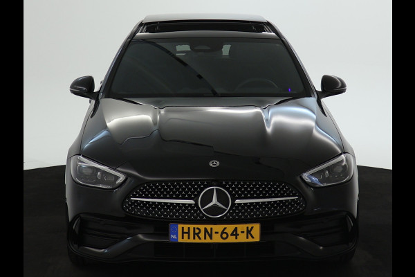 Mercedes-Benz C-Klasse Estate 300 e AMG Line | Edition AMG-Line | Night Pakket | Trekhaak | Panorama Schuif-Kanteldak | Digital Licht | DC Laden | Stuur en Stoelverwarming | Inclusief 24 maanden MB Certified garantie voor Europa.