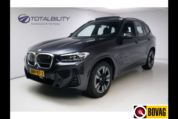 BMW iX3 M-Sport Shadowline 80 kWh 286 PK | Pano | Leer | Elect. stoelen best. met geh. | Camera | Parkeerassistent pakket Licht- en regensensor, PDC, Sportstoelen, Stoelverwarming, Led, Camera