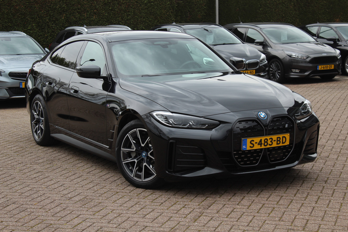 BMW i4 eDrive40 High Executive 84 kWh M Sport / SoH 96% / 360Camera / Head-up / Leder / Harman Kardon / Virtual Cockpit / 18'' / Navigatie / Harman Kardon / Stoelverwarming / DAB / ACC