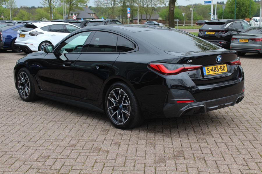 BMW i4 eDrive40 High Executive 84 kWh M Sport / SoH 96% / 360Camera / Head-up / Leder / Harman Kardon / Virtual Cockpit / 18'' / Navigatie / Harman Kardon / Stoelverwarming / DAB / ACC