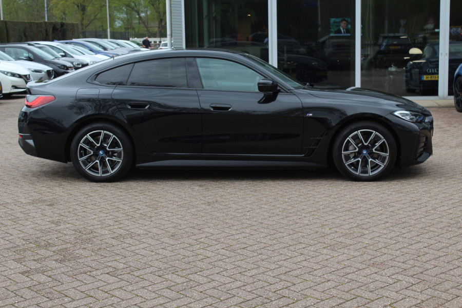 BMW i4 eDrive40 High Executive 84 kWh M Sport / SoH 96% / 360Camera / Head-up / Leder / Harman Kardon / Virtual Cockpit / 18'' / Navigatie / Harman Kardon / Stoelverwarming / DAB / ACC