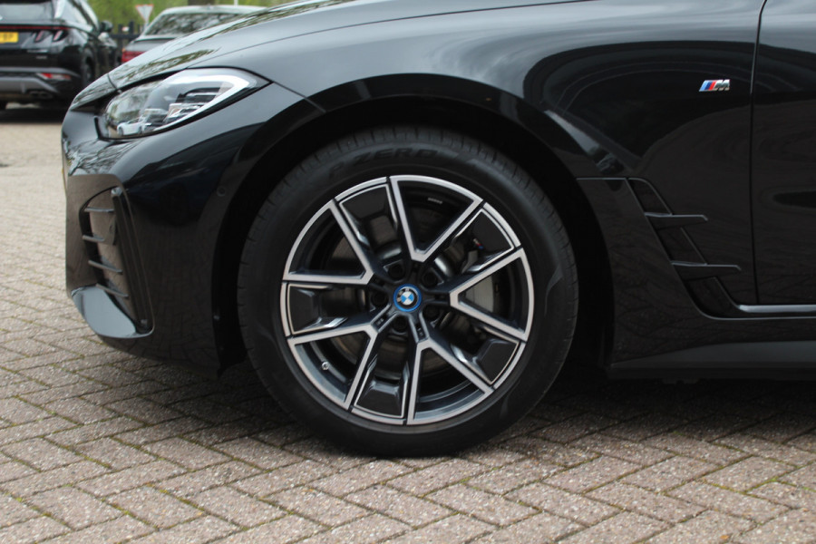 BMW i4 eDrive40 High Executive 84 kWh M Sport / SoH 96% / 360Camera / Head-up / Leder / Harman Kardon / Virtual Cockpit / 18'' / Navigatie / Harman Kardon / Stoelverwarming / DAB / ACC