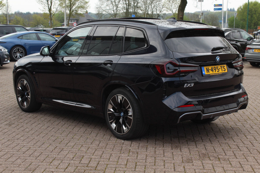 BMW iX3 High Executive 80 kWh / SoH 99% / Trekhaak / Panoramadak / 360Camera / Head-up / 20'' / Leder / Harman Kardon / Sfeerverlichting / Dodehoek / DAB / Stoelverwarming / ACC