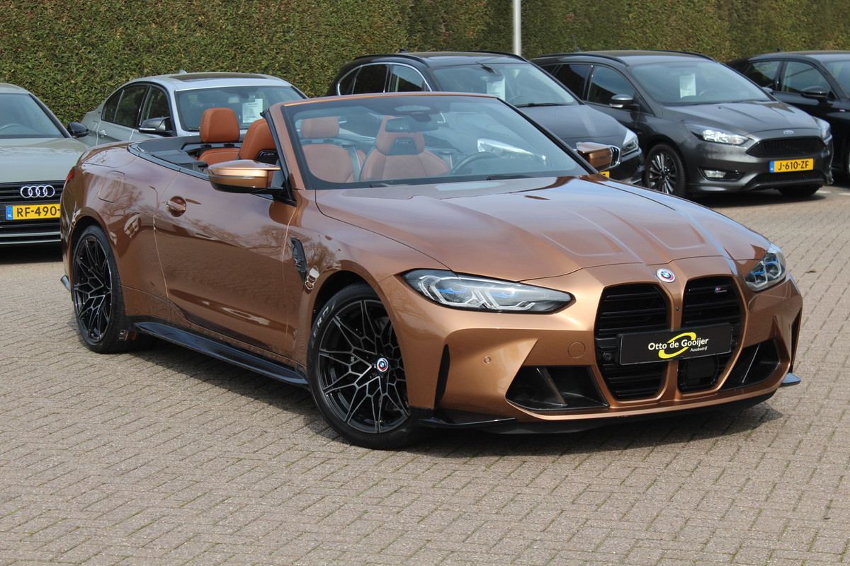 BMW 4 Serie Cabrio M4 xDrive Competition / Camera / Head-up / Carbon / Nekverwarming / H&K / Keyless / Stuurverwarming / ACC / DAB / Dodehoek / Windscherm BMW 4 Serie Cabrio M4 xDrive Competition / Camera / Head-up / Carbon / Nekverwarming / H&K / Keyless / Stuurverwarming / ACC / DAB / Dodehoek / Windscherm