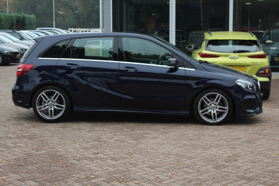 Mercedes-Benz B-Klasse 180 Business Solution AMG Upgrade Edition / Camera / Navigatie / 18'' / Stoelverwarming / Cruise Control