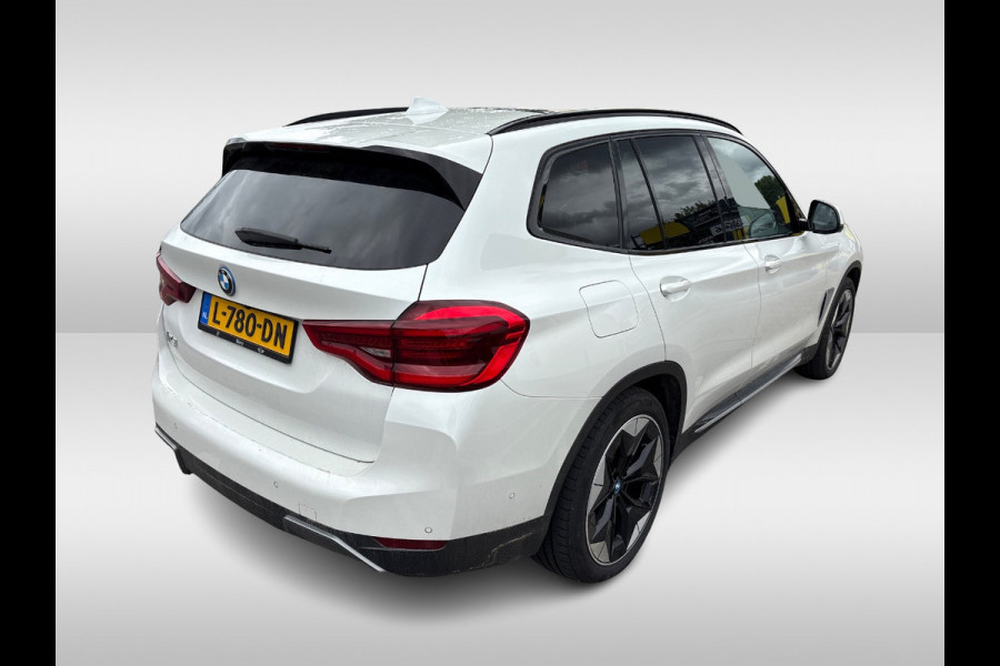 BMW iX3 High Executive 80 kWh / Trekhaak / Panoramadak / 360Camera / Head-up / 20'' / Leder / Harman Kardon / Navigatie / Memory seats / Dodehoek / DAB / Stoelverwarming / Cruise Control Adaptief