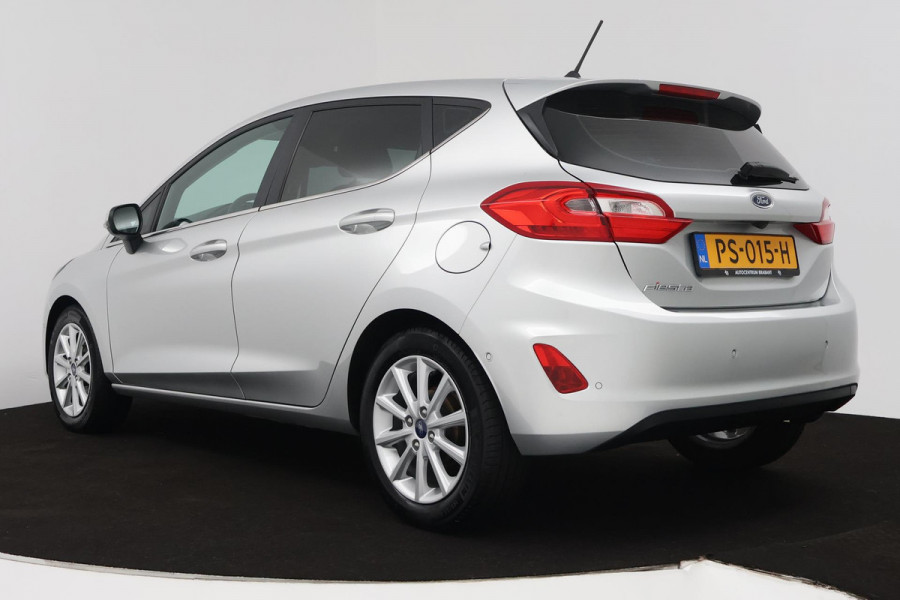 Ford Fiesta 1.0 EcoBoost Titanium Business (NAVIGATIE, PARKEERSENSOREN, ACHTERUITRIJCAMERA, CRUISE ADAPTIEF, NL-AUTO)