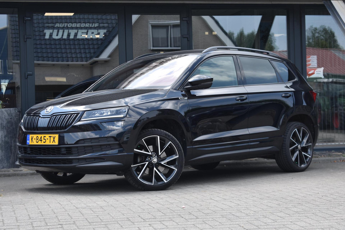 Škoda Karoq 1.5 TSI ACT Sportline | NAP | VIRTUAL COCKPIT | DEALER ONDERHOUDEN | CAMERA | STOELVERWARMING | APPLE CARPLAY Škoda Karoq 1.5 TSI ACT Sportline | NAP | VIRTUAL COCKPIT | DEALER ONDERHOUDEN | CAMERA | STOELVERWARMING | APPLE CARPLAY