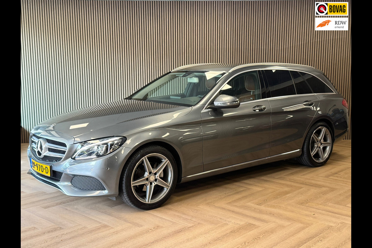 Mercedes-Benz C-Klasse Estate 180 Business Solution Designo AUT. AIRCO NAVIGATIE STOELVERWARMING CAMERA PDC CRUISE TREKHAAK Mercedes-Benz C-Klasse Estate 180 Business Solution Designo AUT. AIRCO NAVIGATIE STOELVERWARMING CAMERA PDC CRUISE TREKHAAK