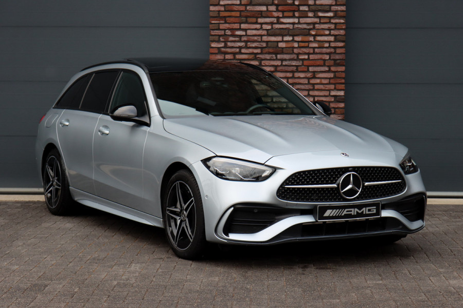 Mercedes-Benz C-Klasse Estate 300 e AMG Line Aut9 | Panoramadak | Trekhaak | Leder | Camera | Sfeerverlichting | Dodehoekassistent | Stoelverwarming | Advanced Sound System | High Perf. LED |