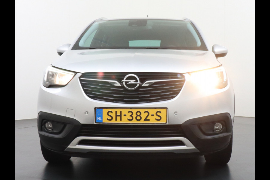 Opel Crossland X T111pk Trekhaak Apple Carplay Android Navi Dual Ecc Cruise Control WiFi Multi-Media 360°Camera Lmv DAB Keyless 1/2 Leder Verkeer Premium Innovation+ Pack LaneAssist Licht+Regensensor AGR Ergonomie Comfort-Sportstoelen EURO 6 Origineel Nederlandse Auto