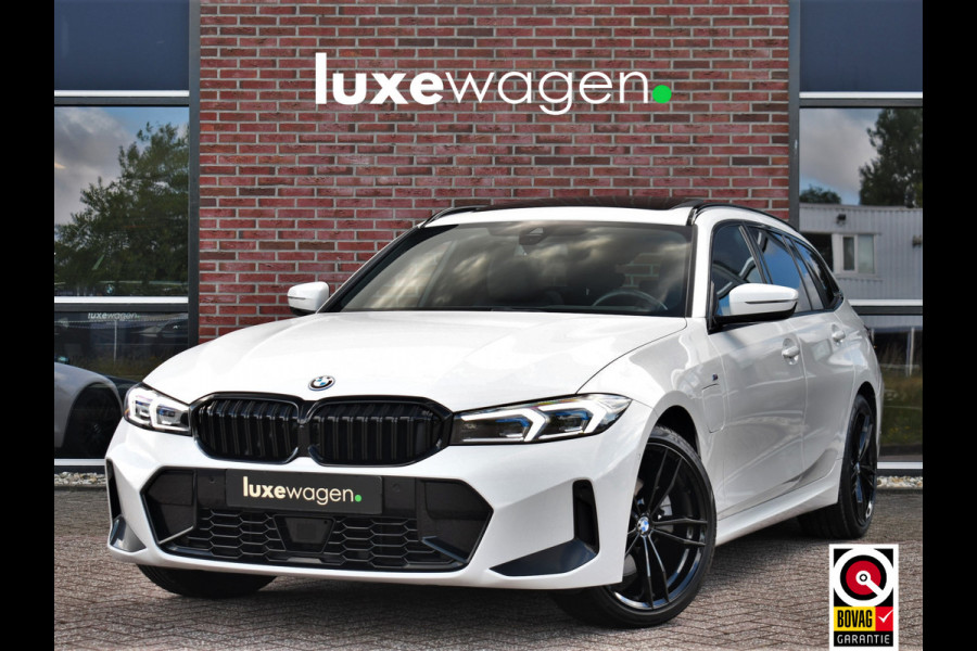 BMW 3 Serie Touring 330e M-Sport Pano ACC El-zetel HUD 19inch Camera Adp-onderstel