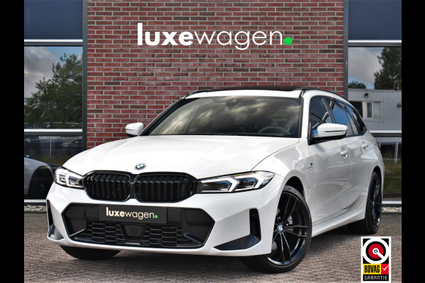 BMW 3 Serie Touring 330e M-Sport Pano ACC El-zetel HUD 19inch Camera Adp-onderstel