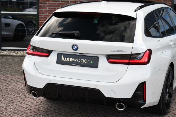 BMW 3 Serie Touring 330e M-Sport Pano ACC El-zetel HUD 19inch Camera Adp-onderstel