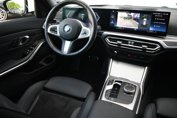 BMW 3 Serie Touring 330e M-Sport Pano ACC El-zetel HUD 19inch Camera Adp-onderstel