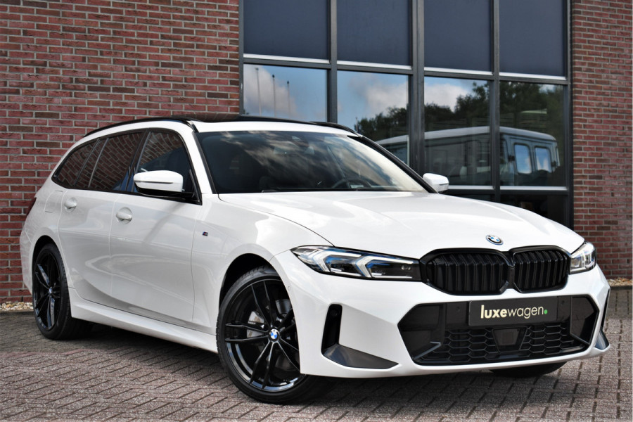 BMW 3 Serie Touring 330e M-Sport Pano ACC El-zetel HUD 19inch Camera Adp-onderstel