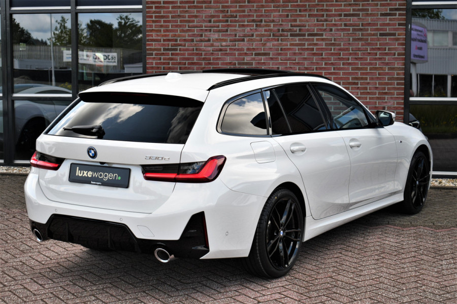BMW 3 Serie Touring 330e M-Sport Pano ACC El-zetel HUD 19inch Camera Adp-onderstel