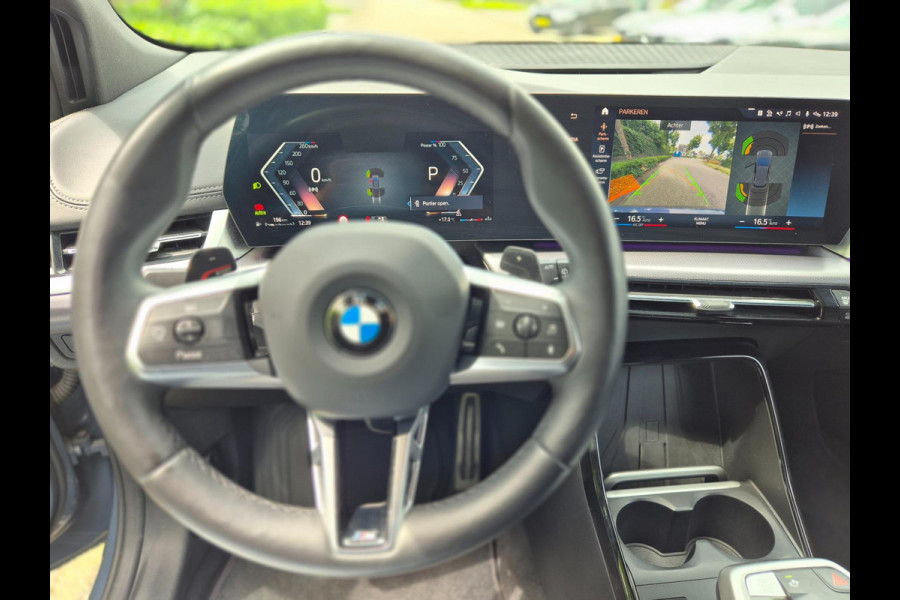 BMW 2 Serie Active Tourer M Sport ACC Line Assist CarPlay Trekhaak Cam H&K Sparkling copper grey Fabriek garantie 2026
