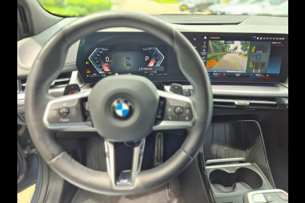 BMW 2 Serie Active Tourer M Sport ACC Line Assist CarPlay Trekhaak Cam H&K Sparkling copper grey Fabriek garantie 2026