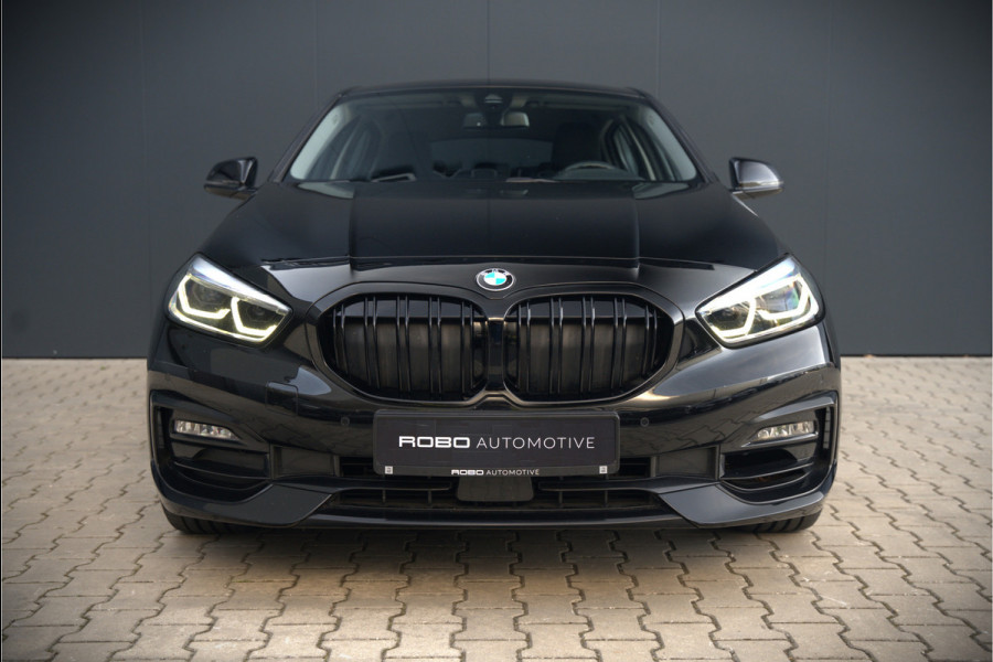 BMW 1-serie 118i High Executive Edition | Virtual Dash | Apple Carplay | Stoelverwarming | Leer | Led | Keyless | PDC | Shadow Line | Automaat | M Sport Stuur | Climate Control | Cruise Control |