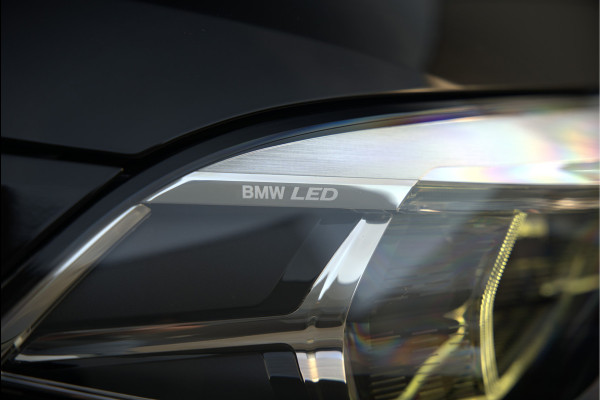 BMW 1-serie 118i High Executive Edition | Virtual Dash | Apple Carplay | Stoelverwarming | Leer | Led | Keyless | PDC | Shadow Line | Automaat | M Sport Stuur | Climate Control | Cruise Control |