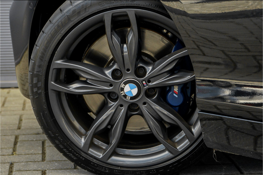 BMW 1-serie M140i Shadow Schuifdak H/K Stuurverw Camera CarPlay Leer