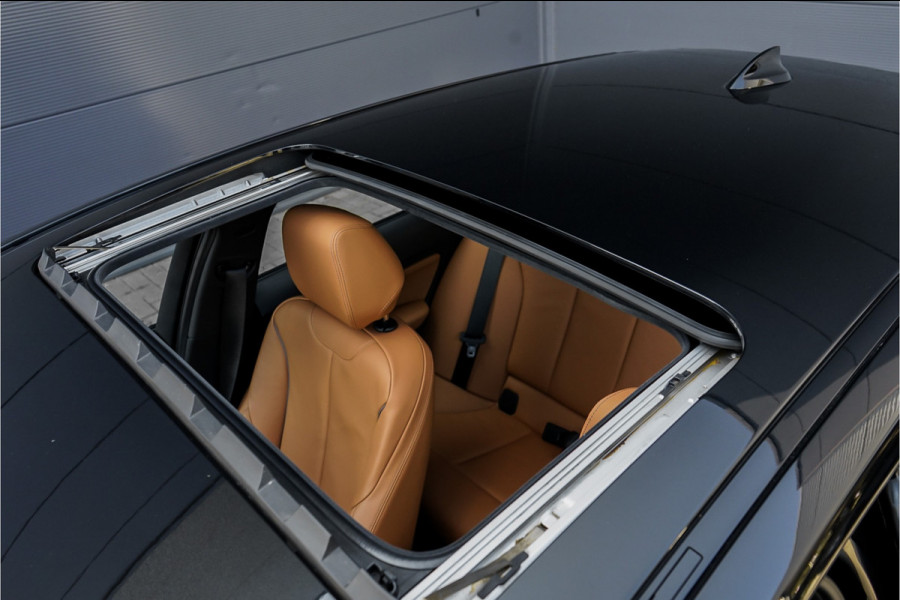 BMW 1-serie M140i Shadow Schuifdak H/K Stuurverw Camera CarPlay Leer