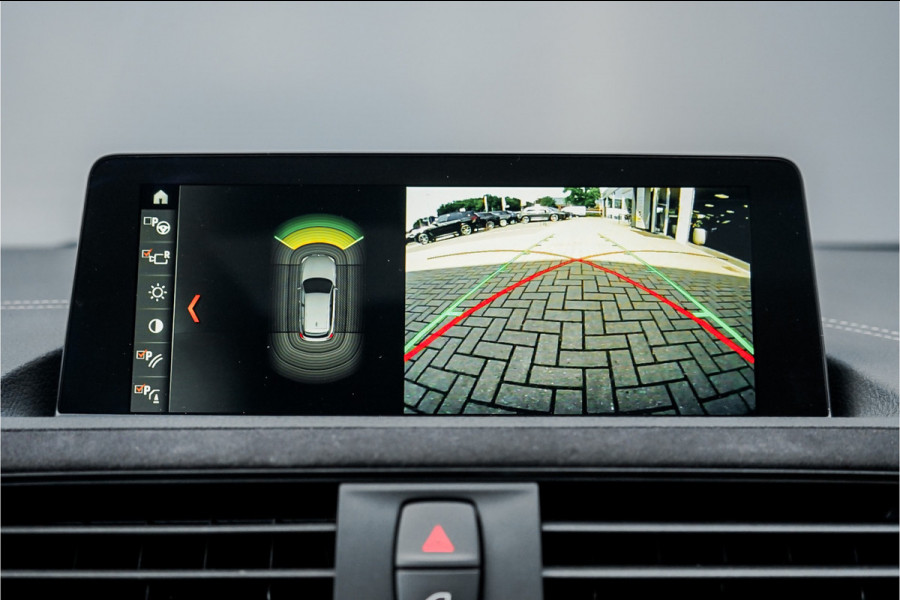 BMW 1-serie M140i Shadow Schuifdak H/K Stuurverw Camera CarPlay Leer