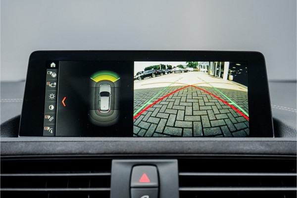 BMW 1-serie M140i Shadow Schuifdak H/K Stuurverw Camera CarPlay Leer